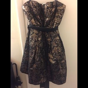 Black and gold removable staples dress